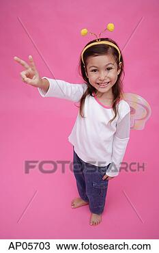 Stock Photo - young girl wearing 
fairy wings and 
deely bopper, 
making peace sign. 
fotosearch - search 
stock photos, 
pictures, images, 
and photo clipart