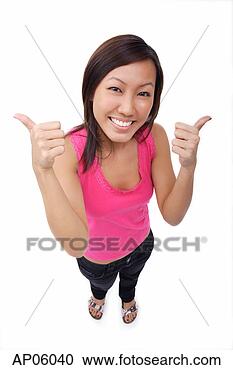 Stock Photography - young woman making 
thumbs up sign, 
smiling up at 
camera. fotosearch 
- search stock 
photos, pictures, 
images, and photo 
clipart