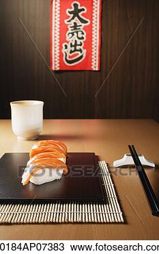 Stock Photo - 4 pieces of salmon 
sushi, nigiri. 
fotosearch - search 
stock photos, 
pictures, images, 
and photo clipart