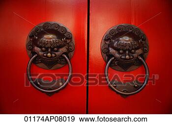 Stock Photograph - pair of brass 
lion head door 
knockers at temple. 
fotosearch - search 
stock photos, 
pictures, images, 
and photo clipart