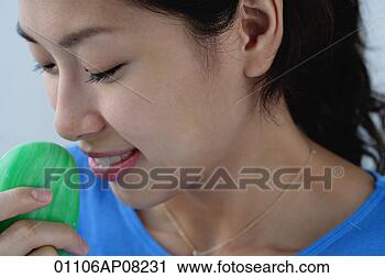 Stock Photography - a young holds 
a bar of soap. 
fotosearch - search 
stock photos, 
pictures, images, 
and photo clipart