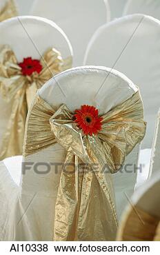 Stock Photo - chairs with ribbons 
around them. fotosearch 
- search stock 
photos, pictures, 
images, and photo 
clipart