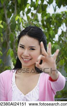 Stock Photography - smiling woman 
giving 
