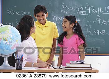 Stock Photograph - teacher speaking 
to two students, 
students smiling. 
fotosearch - search 
stock photos, 
pictures, images, 
and photo clipart