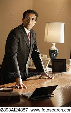 Picture - businessman at 
desk. fotosearch 
- search stock 
photos, pictures, 
images, and photo 
clipart