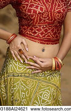 Stock Photography - sexy woman in 
sari, belly piercing. 
fotosearch - search 
stock photos, 
pictures, images, 
and photo clipart