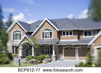 Picture - front of large 
house on sunny 
day. fotosearch 
- search stock 
photos, pictures, 
images, and photo 
clipart