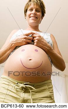Stock Photography - pregnant woman 
with smiley face 
on belly. fotosearch 
- search stock 
photos, pictures, 
images, and photo 
clipart