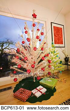 Stock Photography - two fake christmas 
trees in living 
room. fotosearch 
- search stock 
photos, pictures, 
images, and photo 
clipart