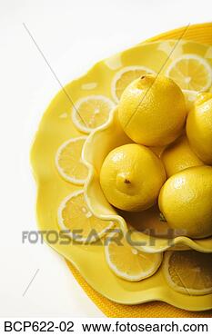 Stock Photo - closeup of lemons 
and lemon slices. 
fotosearch - search 
stock photos, 
pictures, images, 
and photo clipart