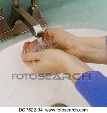 Stock Photo - closeup of washing 
hands in bathroom 
sink. fotosearch 
- search stock 
photos, pictures, 
images, and photo 
clipart