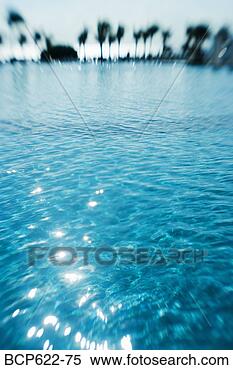 Stock Image - glistening blue 
water cancun mexico. 
fotosearch - search 
stock photos, 
pictures, images, 
and photo clipart