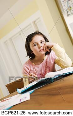 Stock Photo - grade school girl 
distracted from 
homework. fotosearch 
- search stock 
photos, pictures, 
images, and photo 
clipart