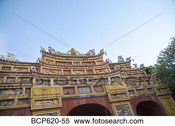 Stock Image - ornate façade 
of vietnamese 
citadel with sky. 
fotosearch - search 
stock photos, 
pictures, images, 
and photo clipart