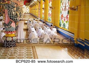 Stock Image - rows of nuns and 
monks in vietnamese 
temple. fotosearch 
- search stock 
photos, pictures, 
images, and photo 
clipart