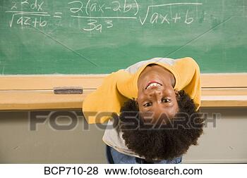 Stock Photo - boy bending over 
backward in front 
of blackboard. 
fotosearch - search 
stock photos, 
pictures, images, 
and photo clipart