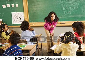 Stock Photograph - female teacher 
asking student 
a question. fotosearch 
- search stock 
photos, pictures, 
images, and photo 
clipart
