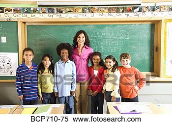 Stock Image - portrait of female 
teacher and students 
in classroom. 
fotosearch - search 
stock photos, 
pictures, images, 
and photo clipart