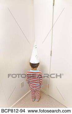 Stock Photo - boy wearing dunce 
cap in corner. 
fotosearch - search 
stock photos, 
pictures, images, 
and photo clipart