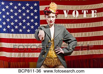 Stock Photo - woman wearing 
military jacket 
in front of american 
flag. fotosearch 
- search stock 
photos, pictures, 
images, and photo 
clipart