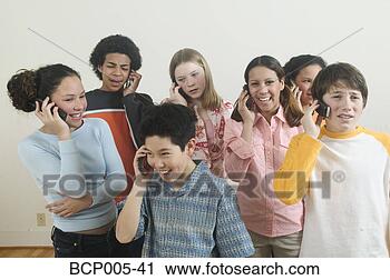 Stock Photography - seven teenagers 
talking on mobile 
phones. fotosearch 
- search stock 
photos, pictures, 
images, and photo 
clipart
