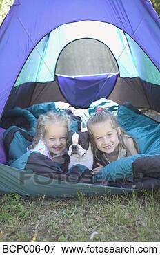 Picture - sisters and dog 
in a tent. fotosearch 
- search stock 
photos, pictures, 
images, and photo 
clipart