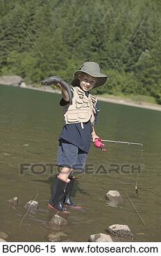 Stock Image - young boy fishing 
in a river. fotosearch 
- search stock 
photos, pictures, 
images, and photo 
clipart