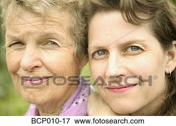 Picture - portrait of a 
mother and her 
adult daughter. 
fotosearch - search 
stock photos, 
pictures, images, 
and photo clipart