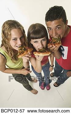 Picture - three teenagers 
eating pizza. 
fotosearch - search 
stock photos, 
pictures, images, 
and photo clipart