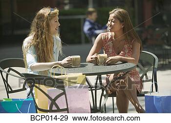 Stock Photograph - two friends taking 
a coffee break 
after shopping. 
fotosearch - search 
stock photos, 
pictures, images, 
and photo clipart