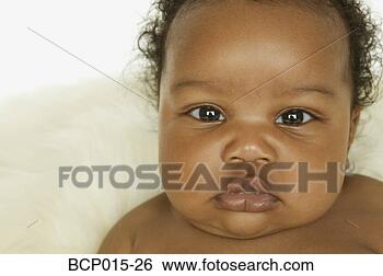 Stock Photo - close-up portrait 
of a baby girl. 
fotosearch - search 
stock photos, 
pictures, images, 
and photo clipart