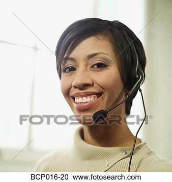Stock Photography - portrait of a 
smiling,  multi-ethnic 
woman,  30s,  
wearing a. fotosearch 
- search stock 
photos, pictures, 
images, and photo 
clipart