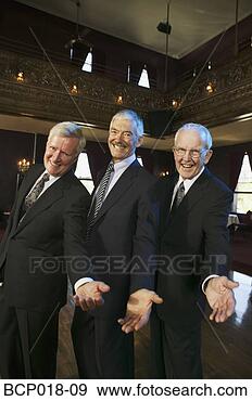 Stock Photograph - three senior men 
holding out their 
hands on the dance 
floor. fotosearch 
- search stock 
photos, pictures, 
images, and photo 
clipart