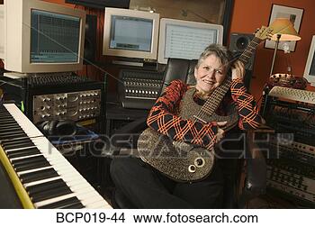 Stock Photo - woman in a computerized 
recording studio. 
fotosearch - search 
stock photos, 
pictures, images, 
and photo clipart