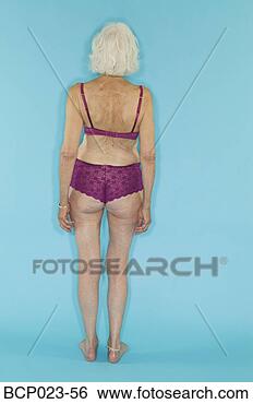 Stock Photo - a senior woman 
modeling lingerie. 
fotosearch - search 
stock photos, 
pictures, images, 
and photo clipart
