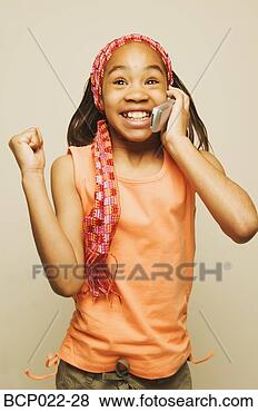 Stock Photo - a girl talking 
on a mobile phone. 
fotosearch - search 
stock photos, 
pictures, images, 
and photo clipart