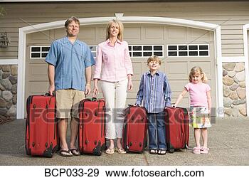 Stock Photograph - family standing 
together with 
luggage. fotosearch 
- search stock 
photos, pictures, 
images, and photo 
clipart
