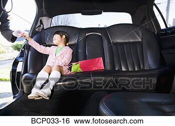 Stock Photo - girl sitting in 
limousine. fotosearch 
- search stock 
photos, pictures, 
images, and photo 
clipart