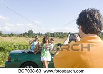 Stock Photo - dad taking snapshot 
of family. fotosearch 
- search stock 
photos, pictures, 
images, and photo 
clipart