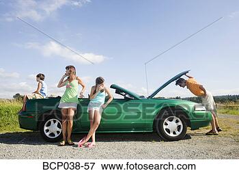 Picture - family coping 
with car breakdown. 
fotosearch - search 
stock photos, 
pictures, images, 
and photo clipart
