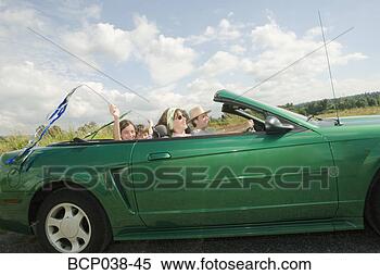 Stock Image - family riding 
in convertible 
car. fotosearch 
- search stock 
photos, pictures, 
images, and photo 
clipart