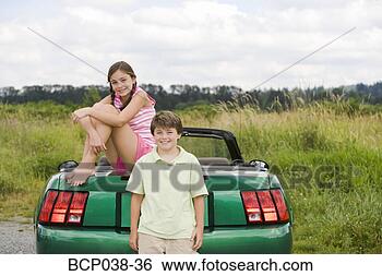 Stock Photo - portrait of a 
brother and sister 
outdoors. fotosearch 
- search stock 
photos, pictures, 
images, and photo 
clipart