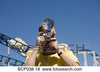 Stock Photo - tourist taking 
a photograph. 
fotosearch - search 
stock photos, 
pictures, images, 
and photo clipart