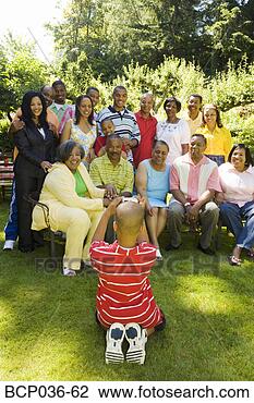 Stock Photo - boy photographing 
his family outdoors. 
fotosearch - search 
stock photos, 
pictures, images, 
and photo clipart