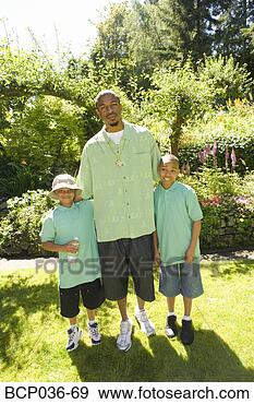 Stock Photograph - father and sons 
outdoors. fotosearch 
- search stock 
photos, pictures, 
images, and photo 
clipart