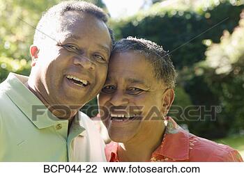 Stock Photo - portrait of couple 
outdoors. fotosearch 
- search stock 
photos, pictures, 
images, and photo 
clipart
