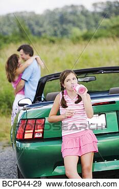 Stock Photograph - unhappy daughter 
of affectionate 
parents. fotosearch 
- search stock 
photos, pictures, 
images, and photo 
clipart