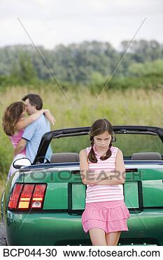 Stock Photography - unhappy daughter 
of affectionate 
parents. fotosearch 
- search stock 
photos, pictures, 
images, and photo 
clipart