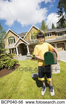Stock Photo - boy with new mailbox 
outside house. 
fotosearch - search 
stock photos, 
pictures, images, 
and photo clipart