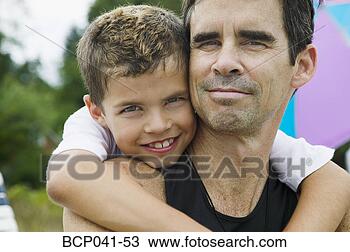 Stock Photo - portrait of father 
and young boy. 
fotosearch - search 
stock photos, 
pictures, images, 
and photo clipart
